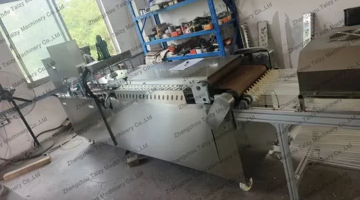 アルゼンチンに販売されたTz-450チャパティロティ製造機 3 新しく作られたチャパティロティ製造機の販売