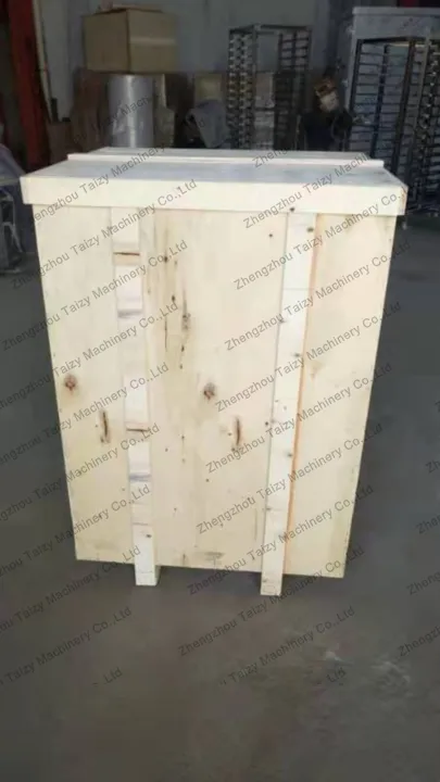 dumpling machine in wooden crate for delivery