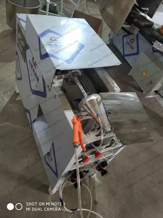 Sugar cone rolling machine